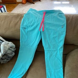 Neon blue figs scrub pants